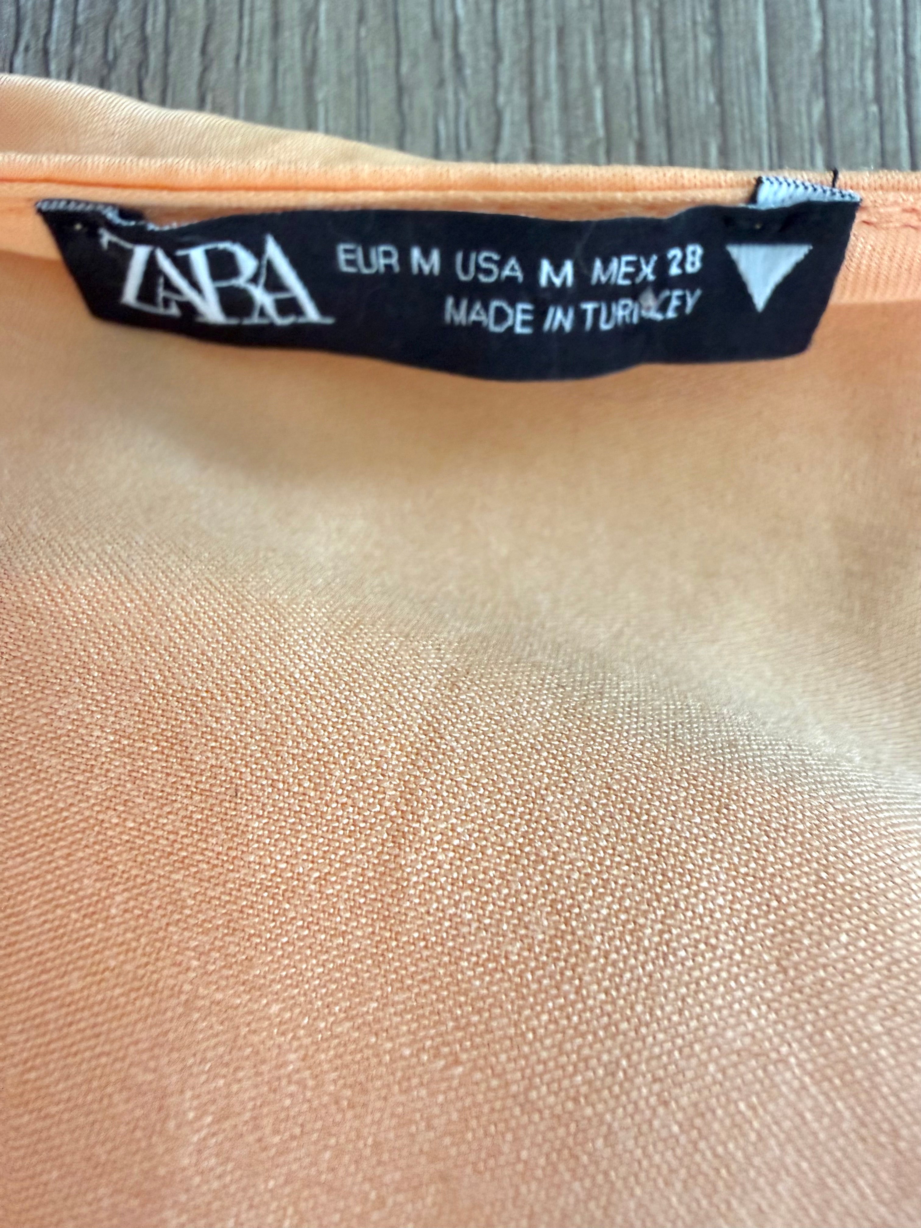 inside label on  Deep V Neck Zara peach dress with batwing sleeve fully lined  