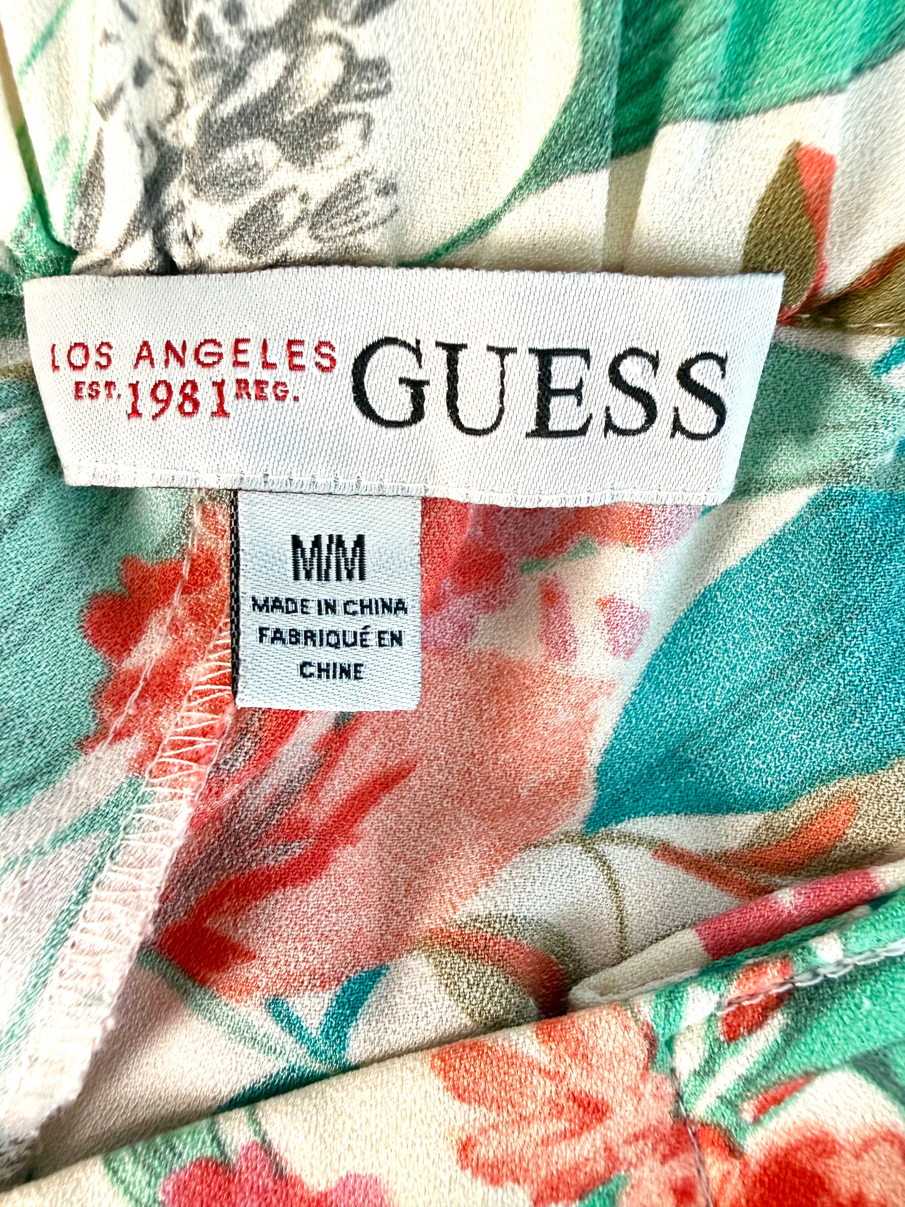 inside label on Guess  Floral Jogger Style Dress Pants at Blue Sparrow 