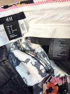 inside label on H&M Slim Fit Ankle Pants with floral pattern 