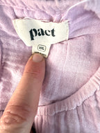 inside label on Pact 100% organic cotton tiered midi dress