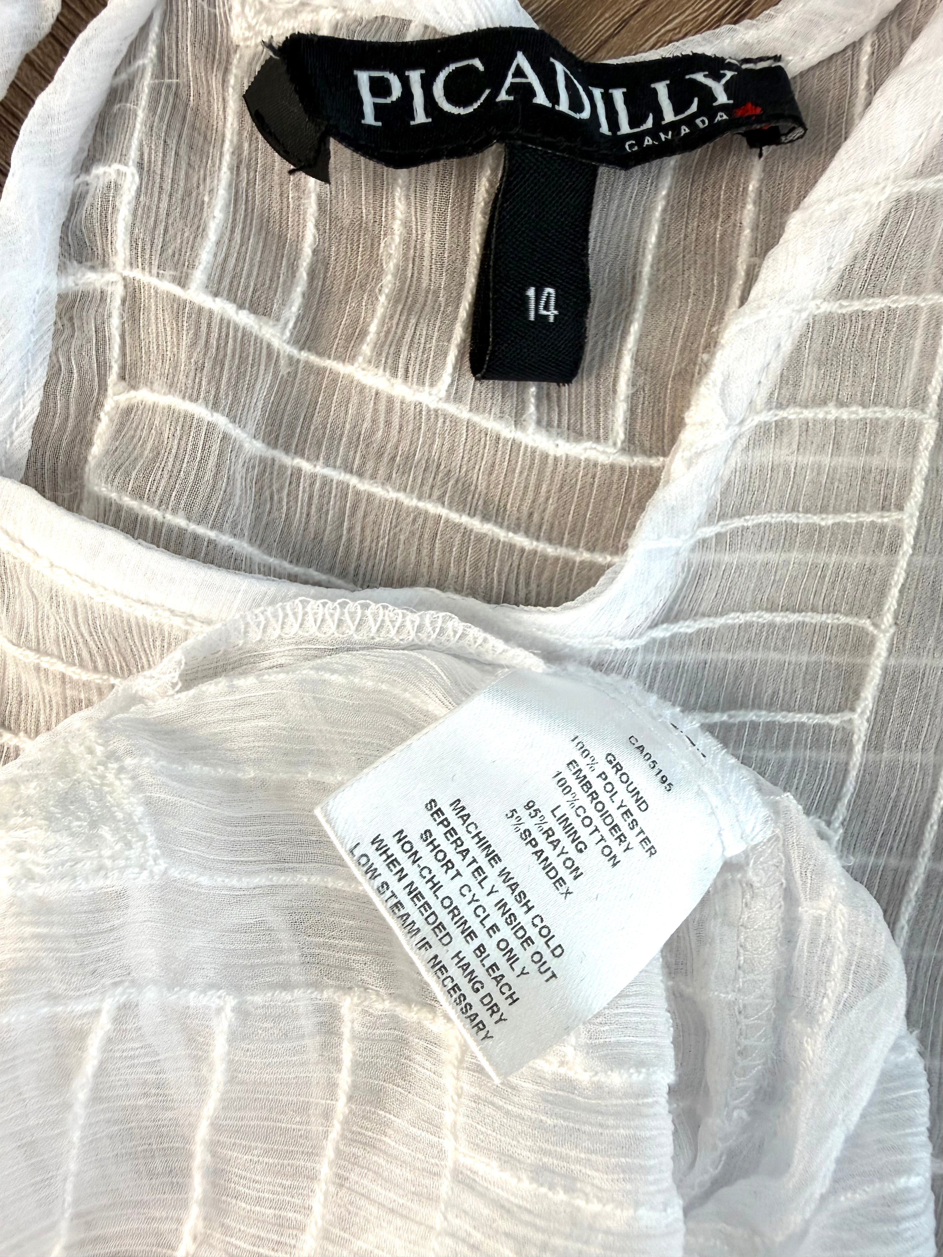 inside label on Picadilly Canada Textured Sheer Top 
