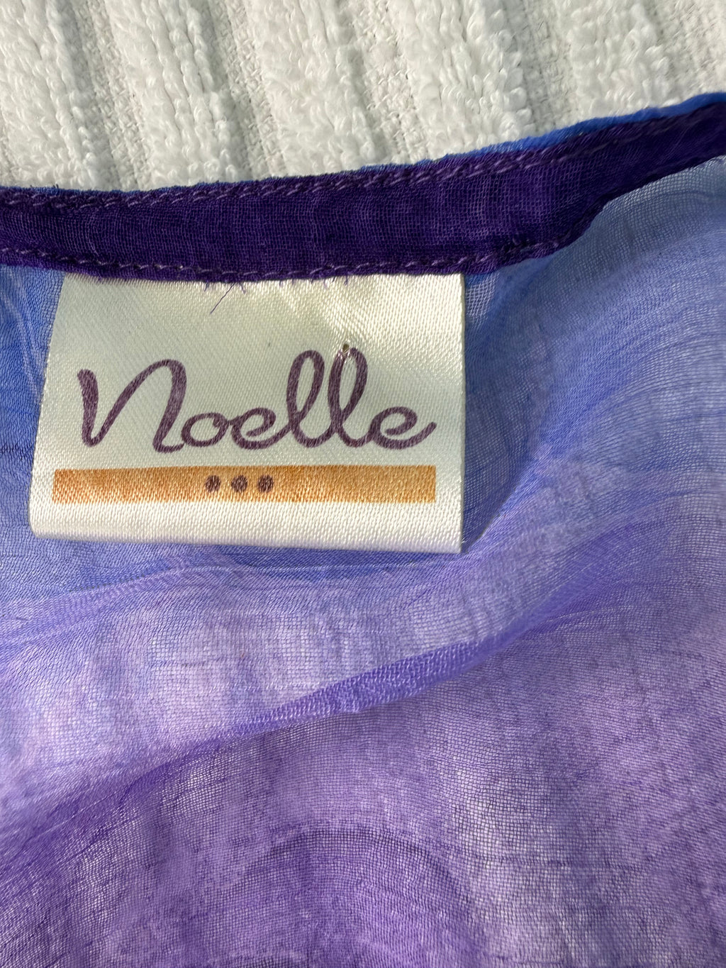 inside label on Sheer Batwing Poncho Top | One Size at Blue Sparrow Resale Shop