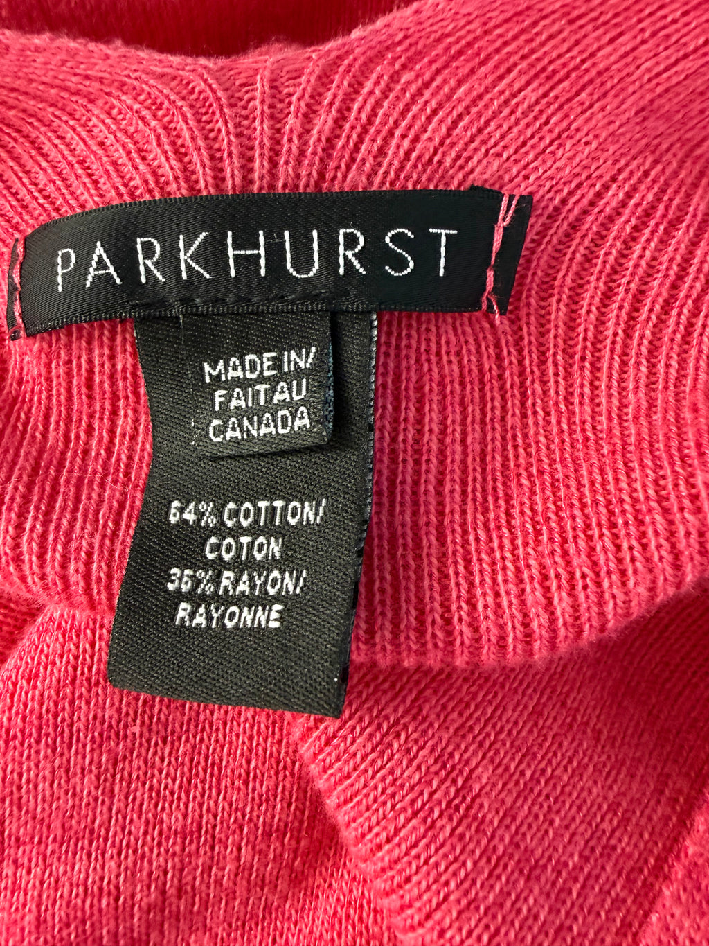 inside label on back of  Made in Canada Parkhurst Draped Wrap Cape  at Blue Sparrow Shop