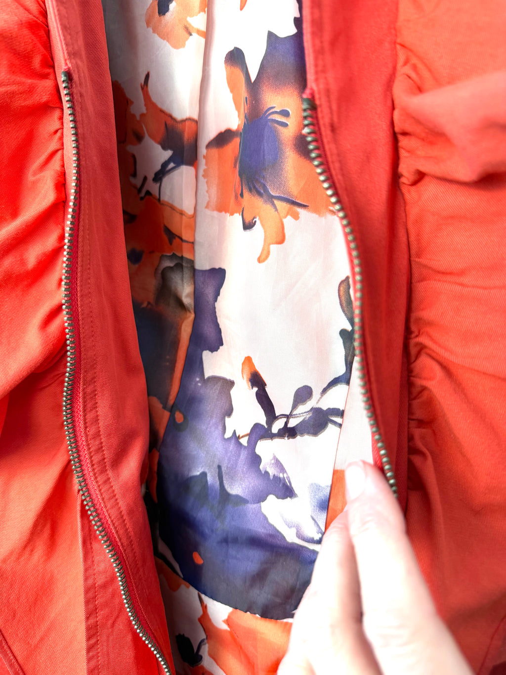 inside lining of THX Merci Collection ruffle trench coat jacket