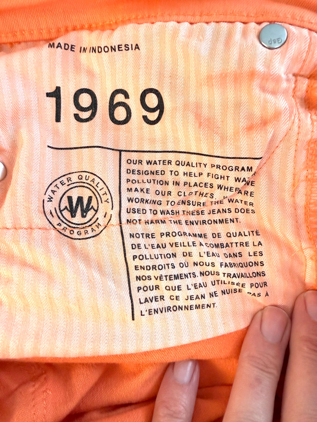 inside message on Gap 1969 orange jeans 