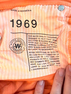 inside message on Gap 1969 orange jeans 