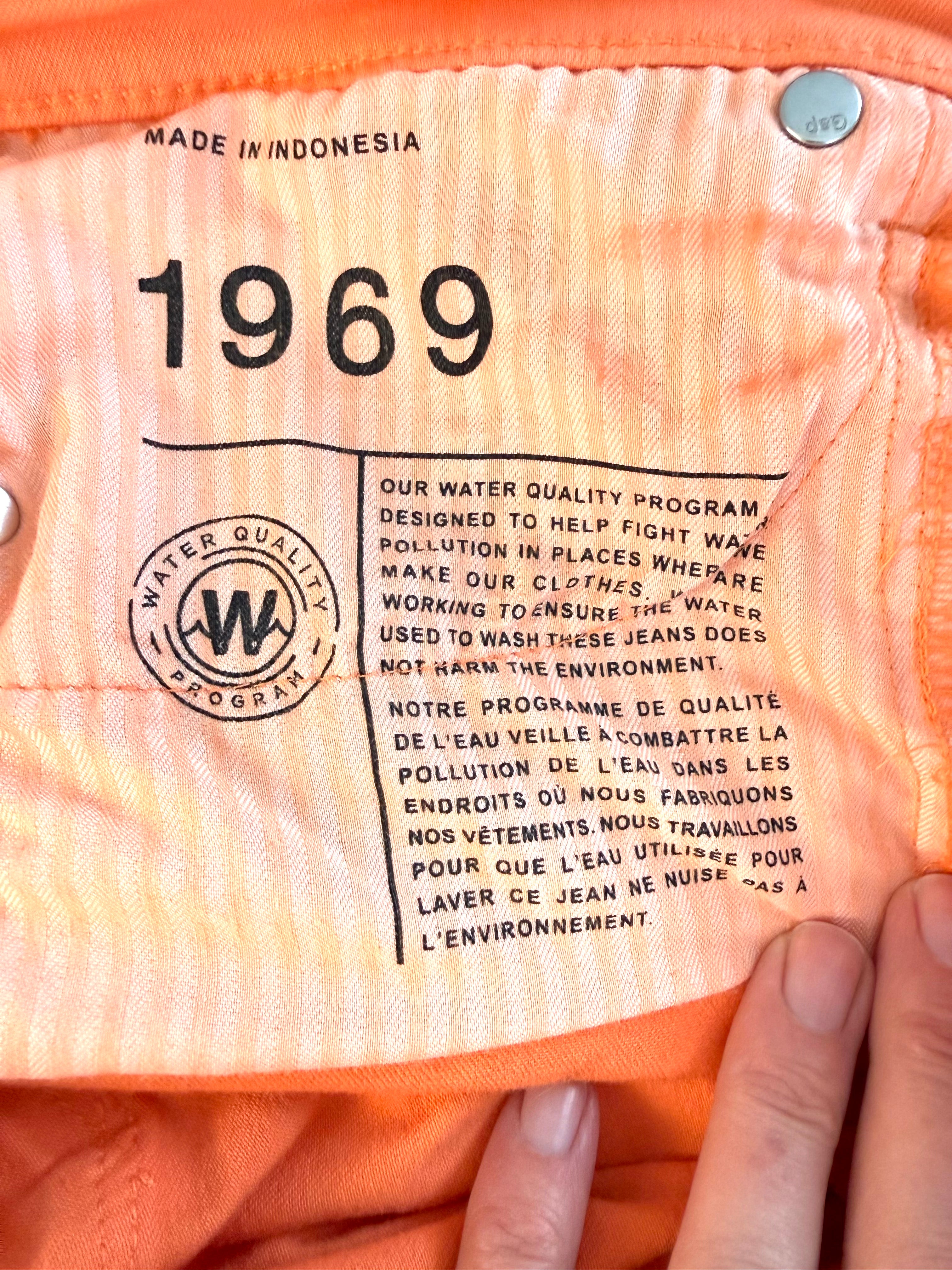 inside message on Gap 1969 orange jeans 