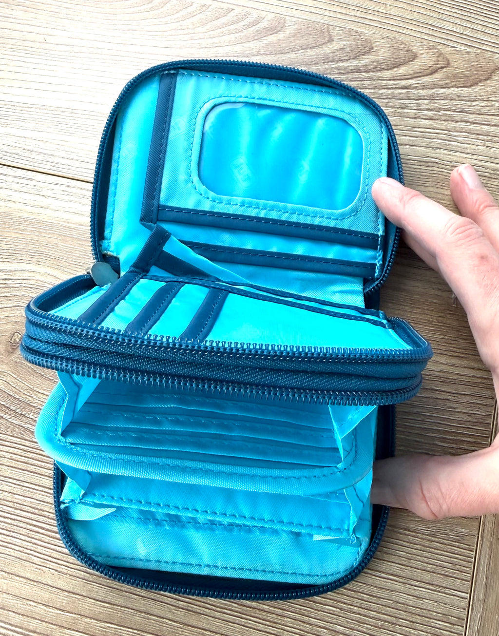 inside of  NWOT Lug Double Zip Wallet 