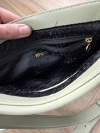 inside of  Riona Sage Green Crossbody Bag | RFID  protection travel purse 