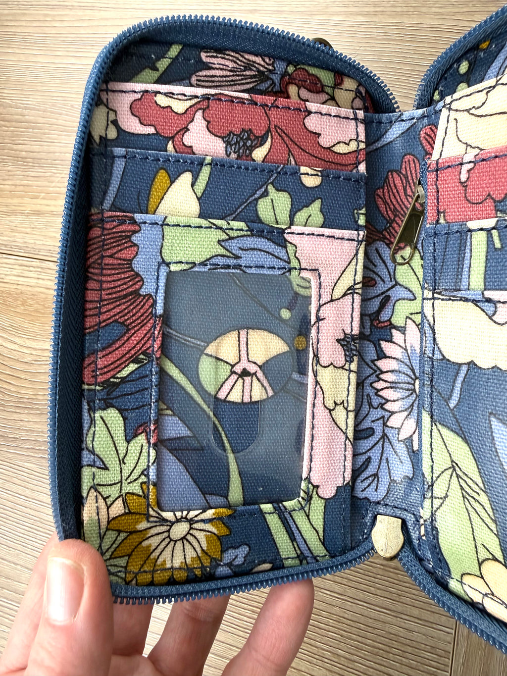 inside of Sakroots Floral Crossbody Phone Wallet 