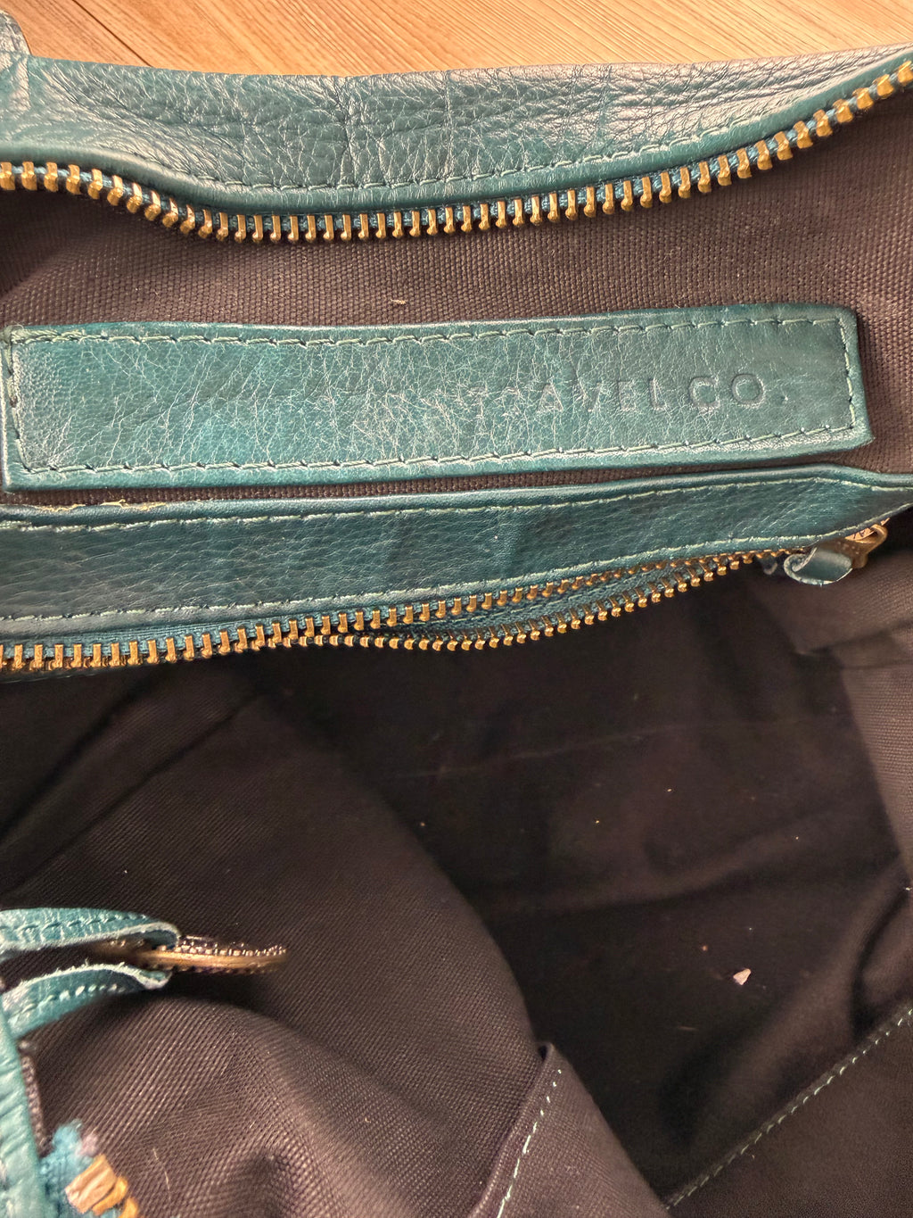 inside of on Wanderers Travel Co Parisian Leather Tote Bag 