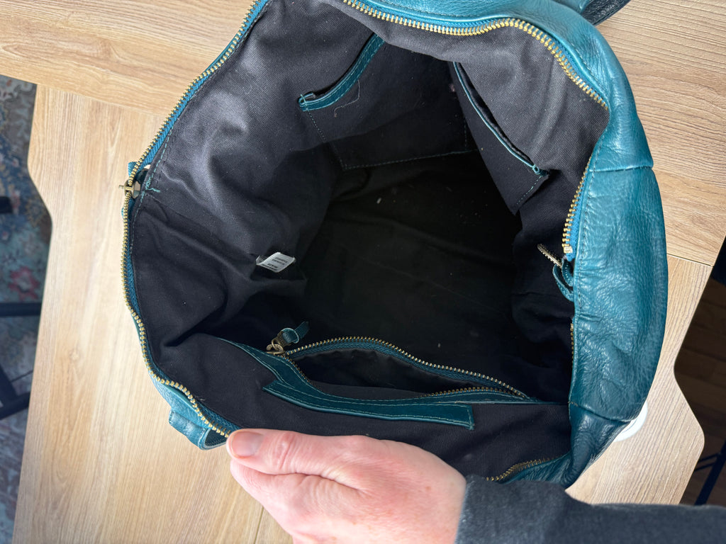 inside of on Wanderers Travel Co Parisian Leather Tote Bag 2