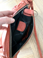 nside of one section of Derek Alexander Leather Crossbody Bag  