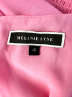 inside tag Melanie Lyne pink chiffon blouse with smocked waist and flutter sleeves
