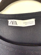 inside tag Zara striped sweater navy and red nautical striped sweater  size medium made in Cambodia