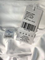 inside tag and original price tag on NWT white swim trunks size small compare at 79.99 at Blue Sparrow Resale Shop 