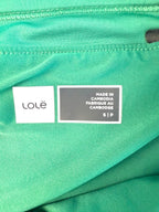 inside tag on green skort made in cambodia size small