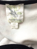 inside tag on Anthropologie Deletta Peplum Tank Top
