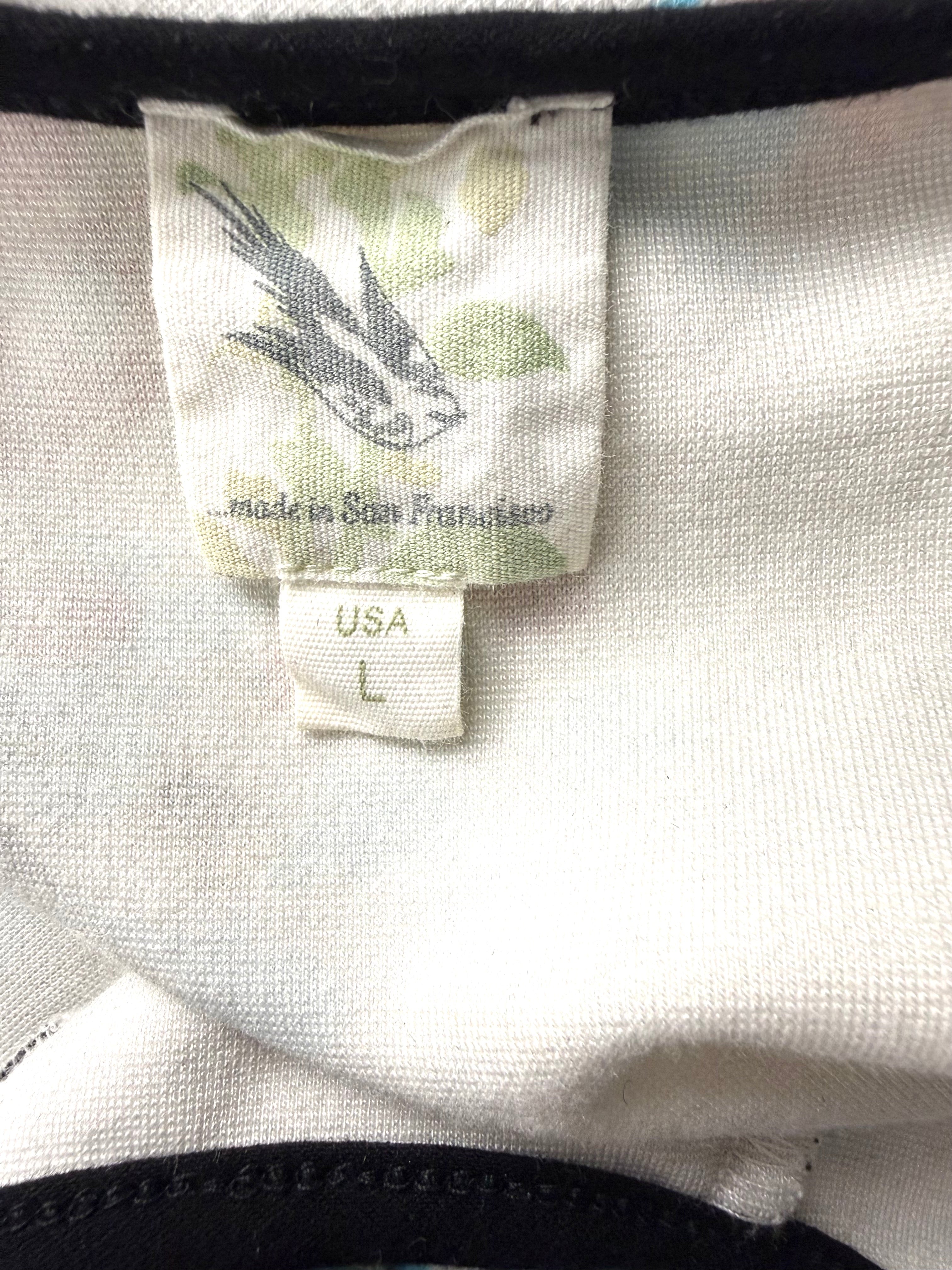 inside tag on Anthropologie Deletta Peplum Tank Top