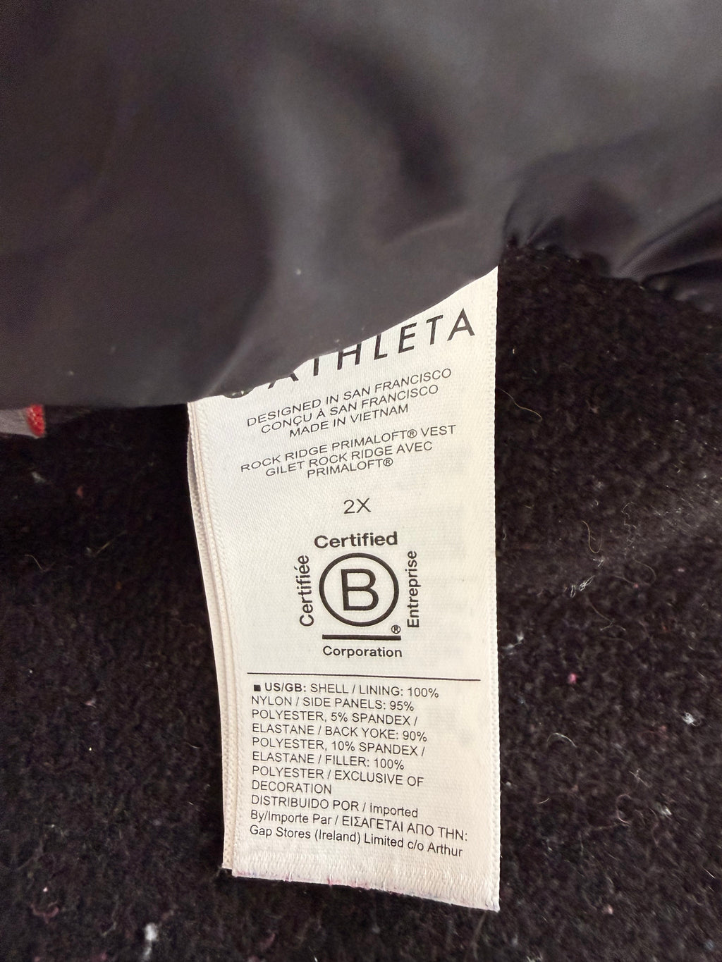 inside tag on Athleta Rock Ridge PrimaLoft Insulated Vest in Black  Size XXL 