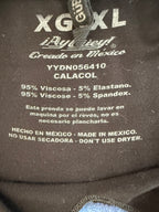 inside tag on ¡Ay Güey! black sleeveless sugar skull embroidered tank top, Día de los Muertos multicolour embroidery at Blue Sparrow Shop
