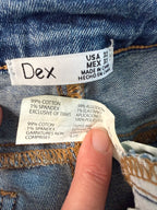 inside tag on Dex embroidered feather skinny jeans medium wash distressed raw hem at Blue Sparrow Shop 
