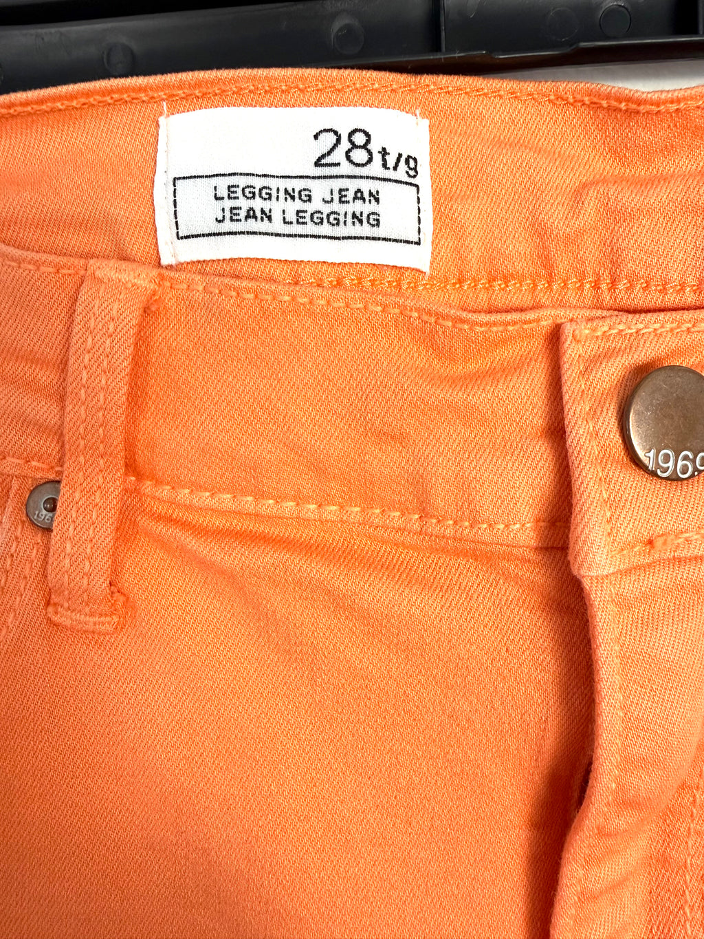 inside tag on GAP 1969 orange skinny jeans women size 28 mid rise stretch denim