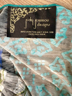 inside tag on Judy Pannou Designs — Canadian Artisan Multi-Print Open Cardigan, Ashton ON  at Blue Sparrow Shop Canadian Resale Reimagined 