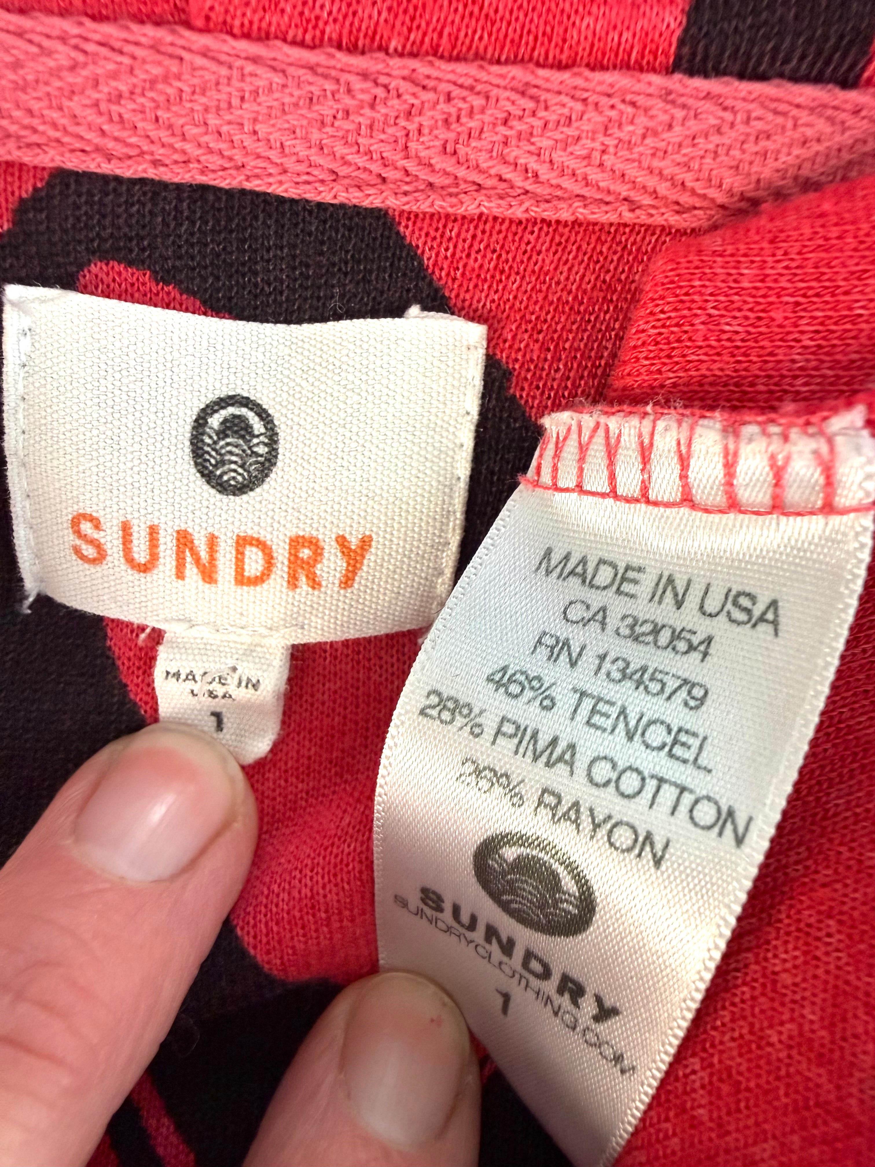 inside tag on Made in USA Sundry Heart Print Zip Hoodie at Blue Sparrow Shop