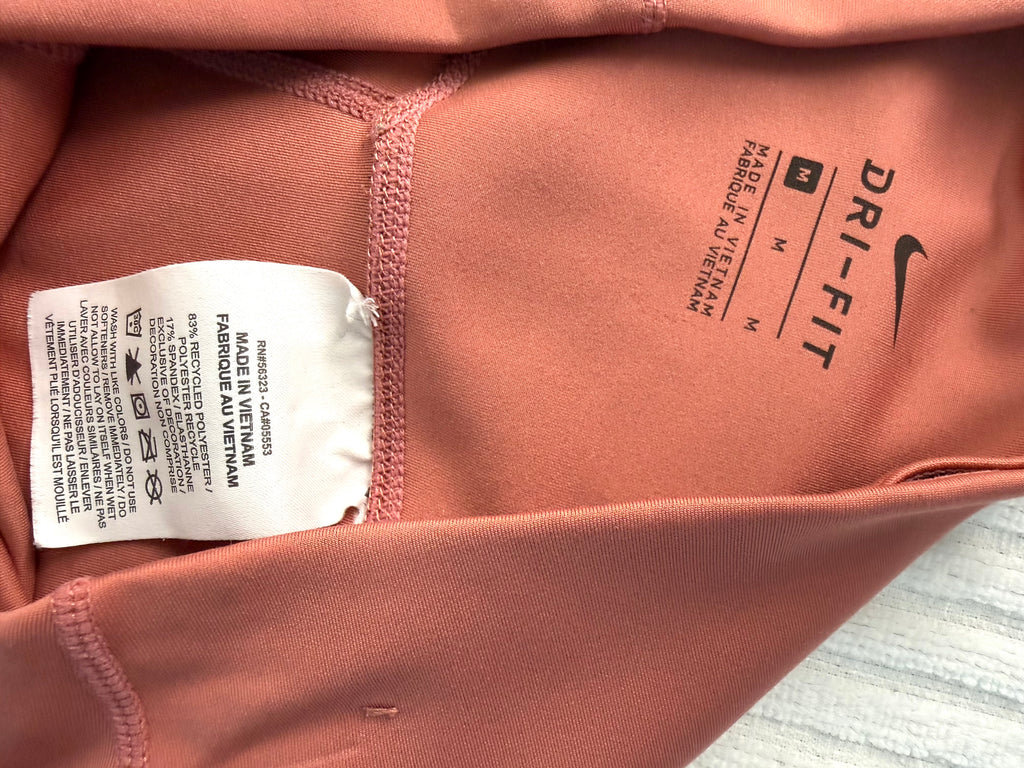 inside tag on Nike Dri-FIT Terracotta Biker Shorts | Size M  at Blue Sparrow Shop