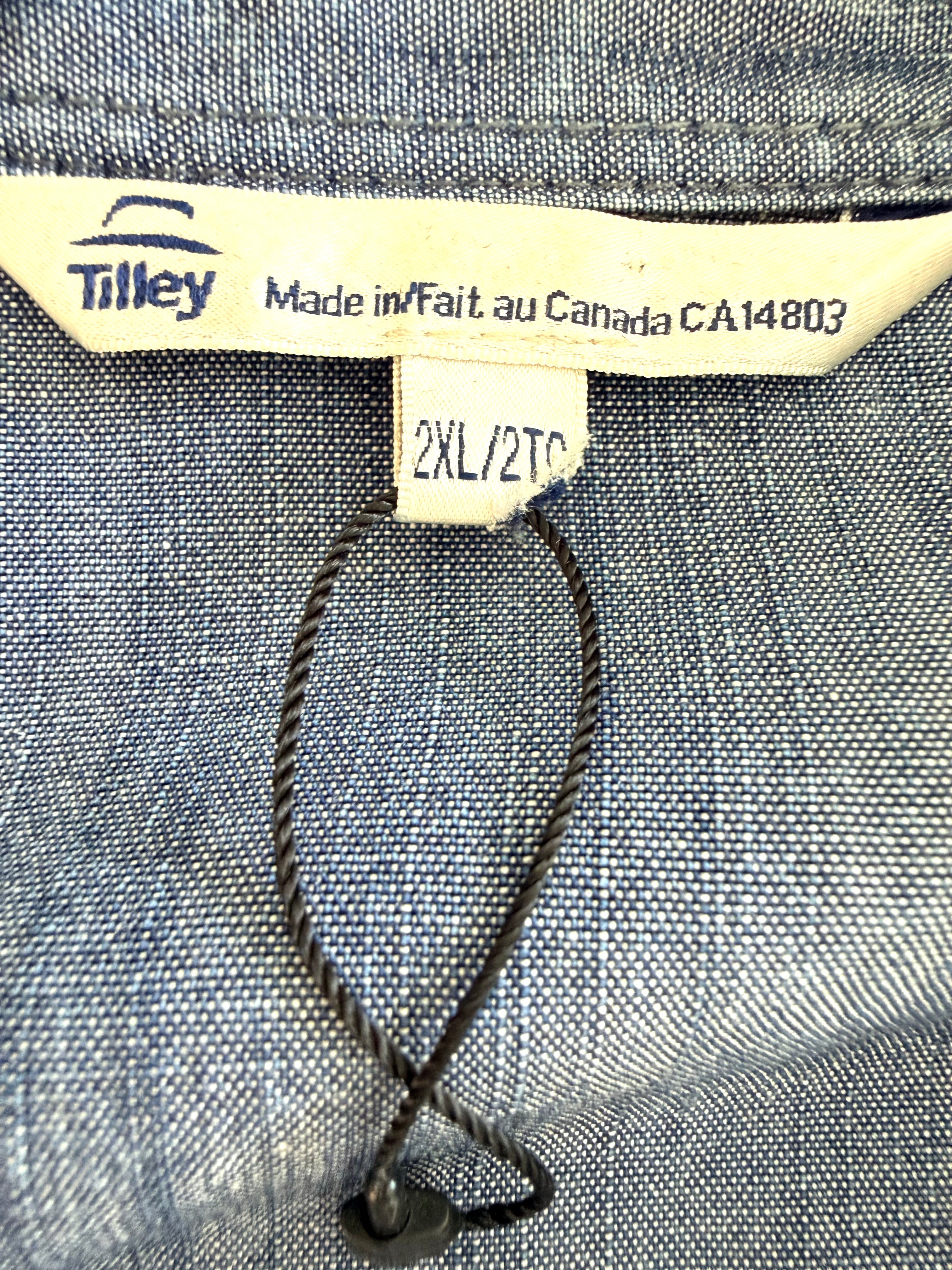 inside tag with loop from new tag on NWOT 100% Tencel Tilley Handpainted Denim Jacket | Size XXL