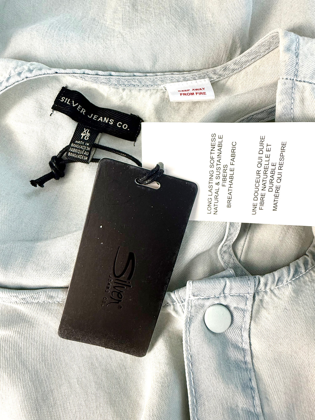 inside tags and new tags on NWT Silver Jeans Co. Jumpsuit 