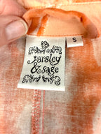 inside tags on 100% Cotton Parsley & Sage — Peach Abstract Floral Jacket, Size S at Blue Sparrow Shop Canadian Resale Reimagined 