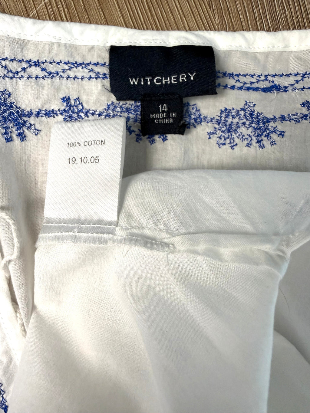 inside tags on 100% Cotton Witchery Embroidered Boho Blouse | Size 14  at Blue Sparrow Shop - Canadian Resale Reimagined