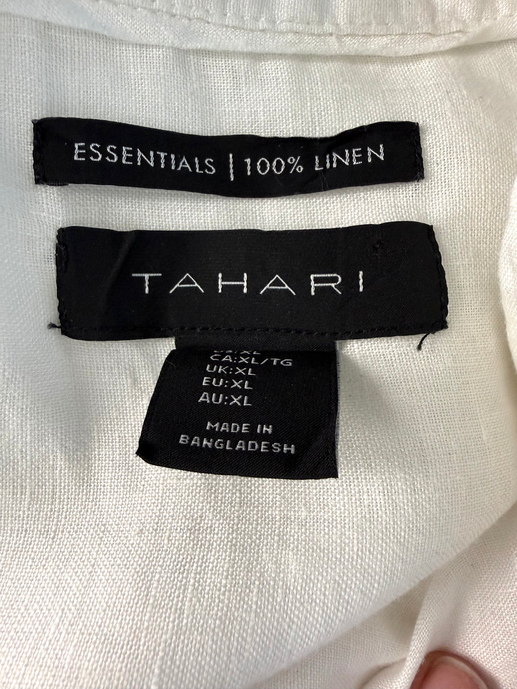 inside tags on 100% Linen Tahari Button-Down Tunic | XL  at Blue Sparrow Resale Shop Canada