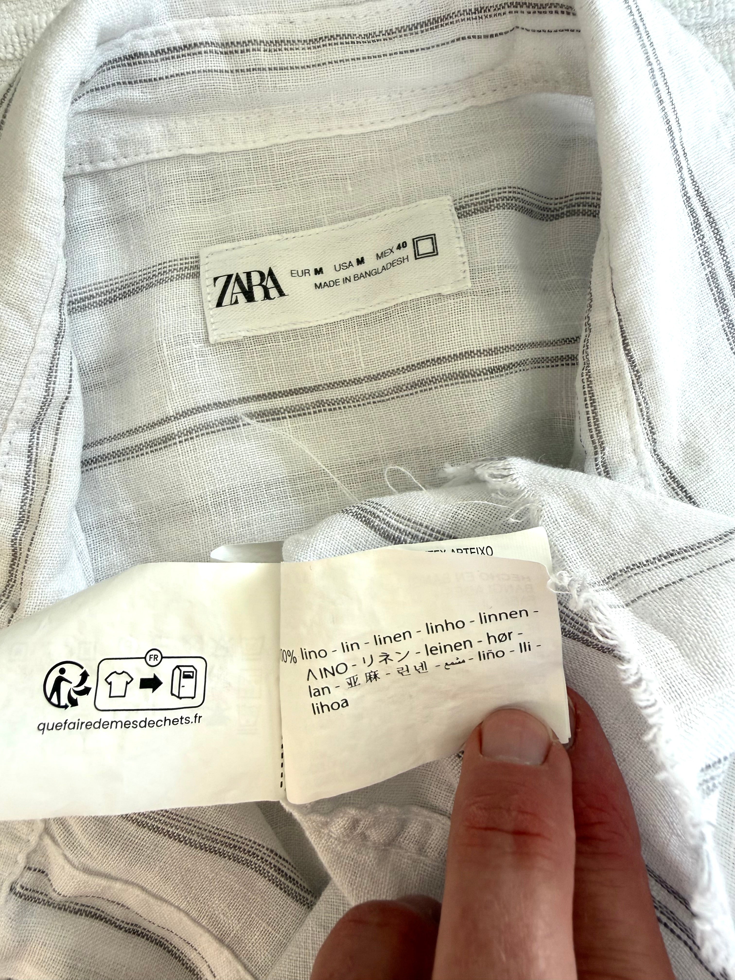 inside tags on 100% Linen Zara Sleeveless Button Front Top | Size M at Blue Sparrow Shop  measuring 44" bust and 24-26" shoulder to hem 