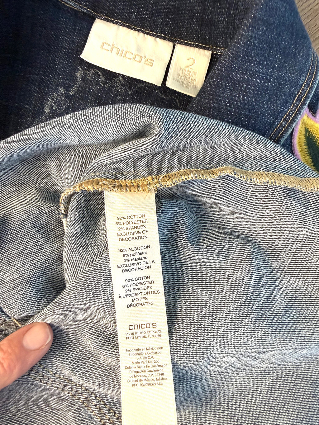 inside tags on Chicos embroidered denim jacket 