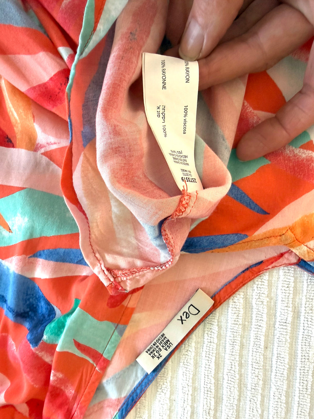 inside tags on DEX Colourful Abstract Print Top | Size 2X at Blue Sparrow Shop