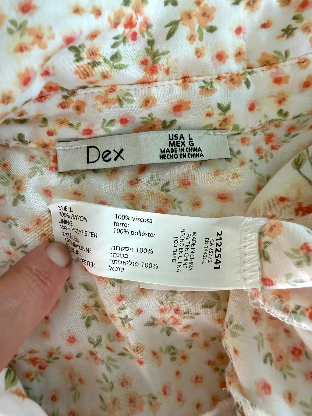 inside tags on Dex Smocked Waist Romantic Midi Dress | Size L at Blue Sparrow Shop