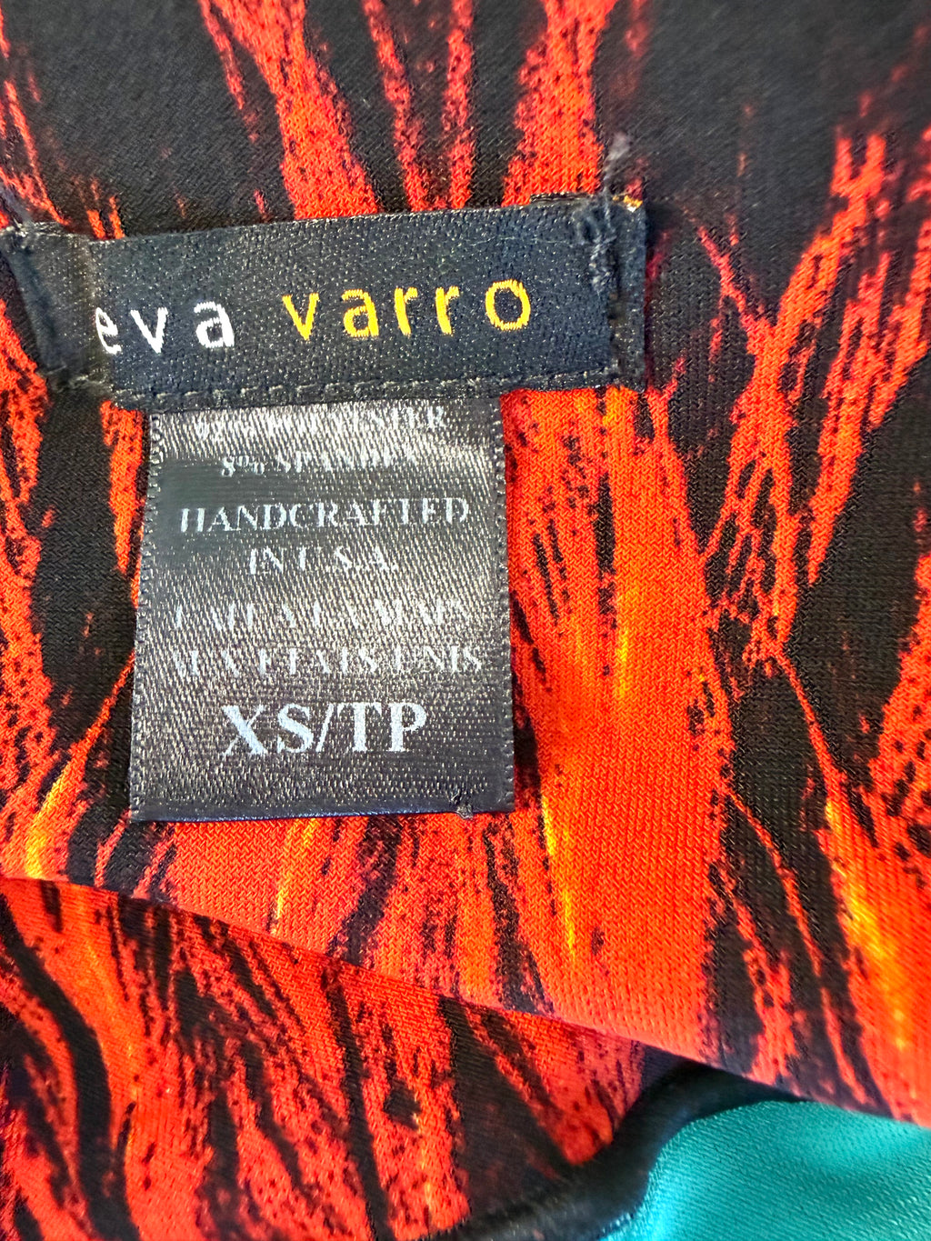 inside tags on Eva Varro Reversible Leggings — Feather Print & Solid Turquoise | Handcrafted in USA | Size XS at Blue Sparrow Shop 