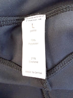 inside tags on Halara Flared Petite Black Stretch Pants | Size L at Blue Sparrow Shop