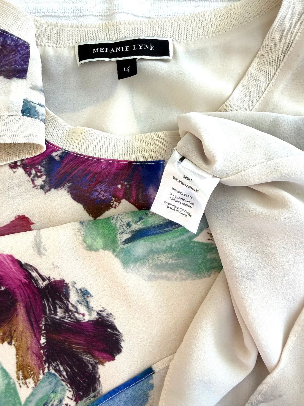 inside tags on Melanie Lyne Sleeveless Top | Size 14 at Blue Sparrow Shop 