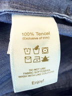 inside tags on NWOT 100% Tencel Tilley Handpainted Denim Jacket | Size XXL