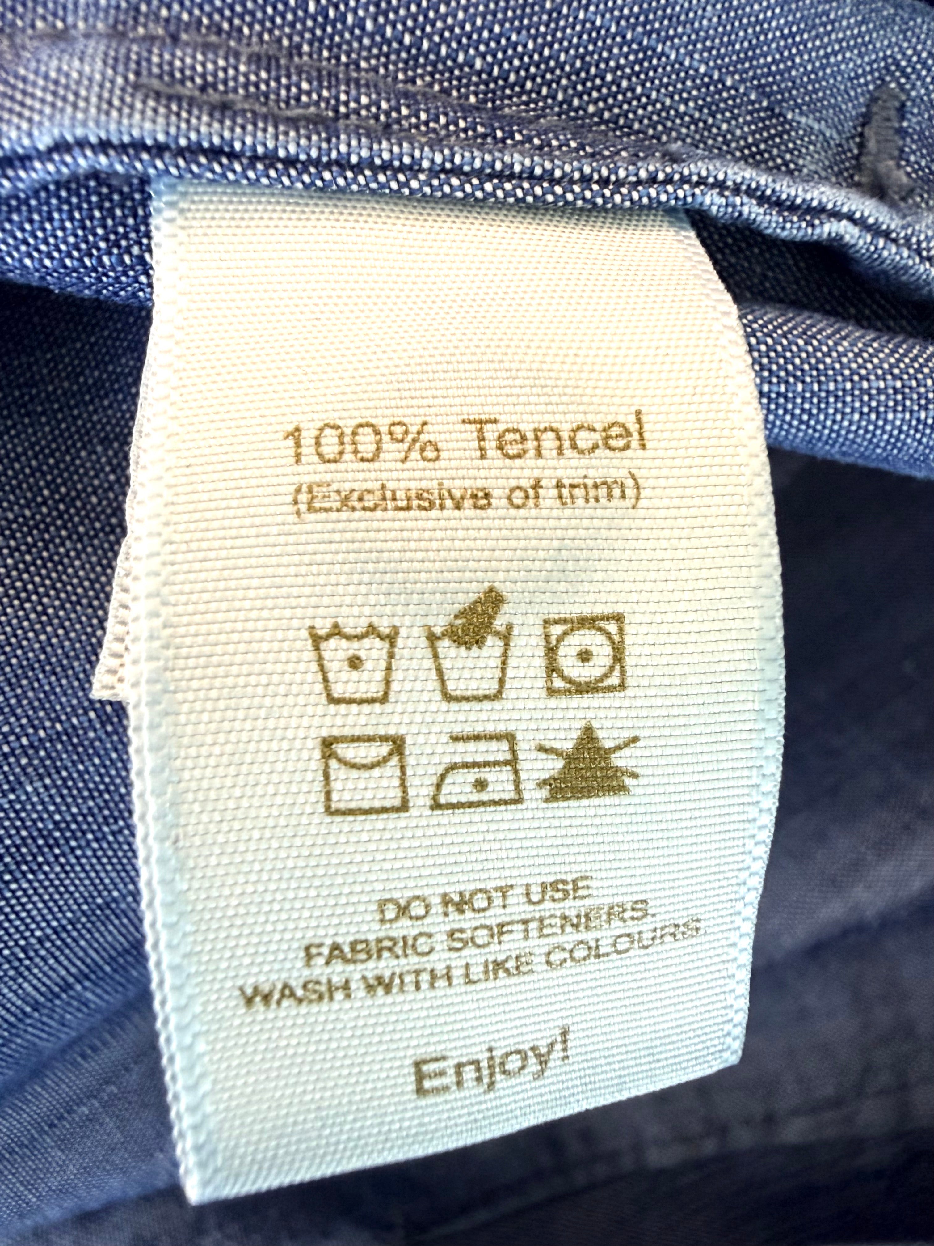 inside tags on NWOT 100% Tencel Tilley Handpainted Denim Jacket | Size XXL