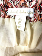 inside tags on NWT House of Harlow 1960 — 55% Linen Cream Rust Floral Midi Skirt, Size L at Blue Sparrow Shop