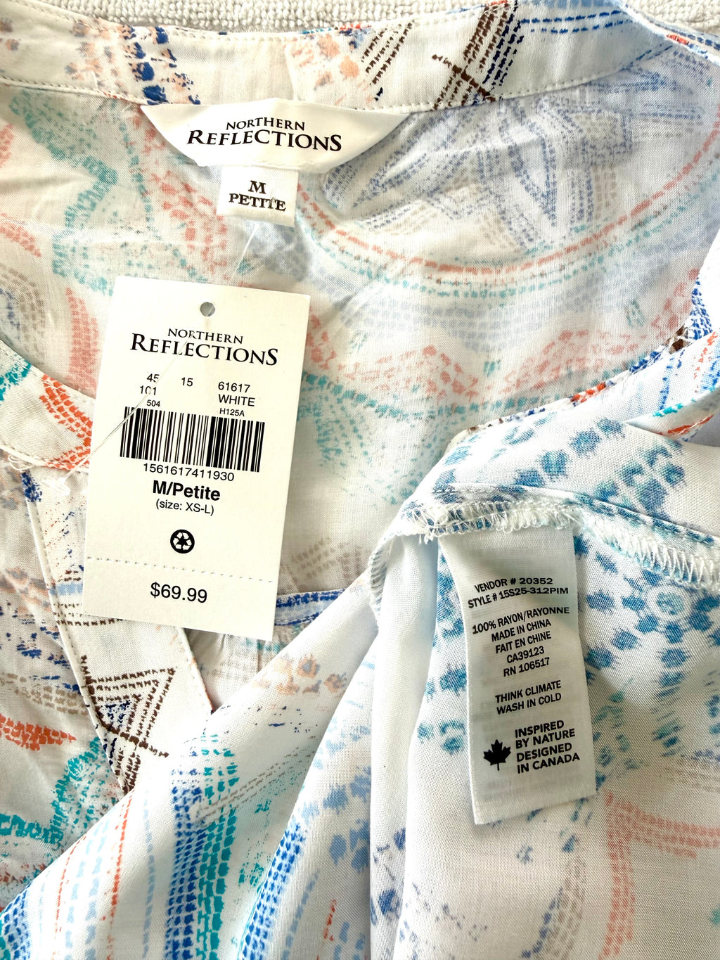 inside tags on NWT Northern Reflections Mandala Print Blouse | Size M at Blue Sparrow Shop compare at $69.99