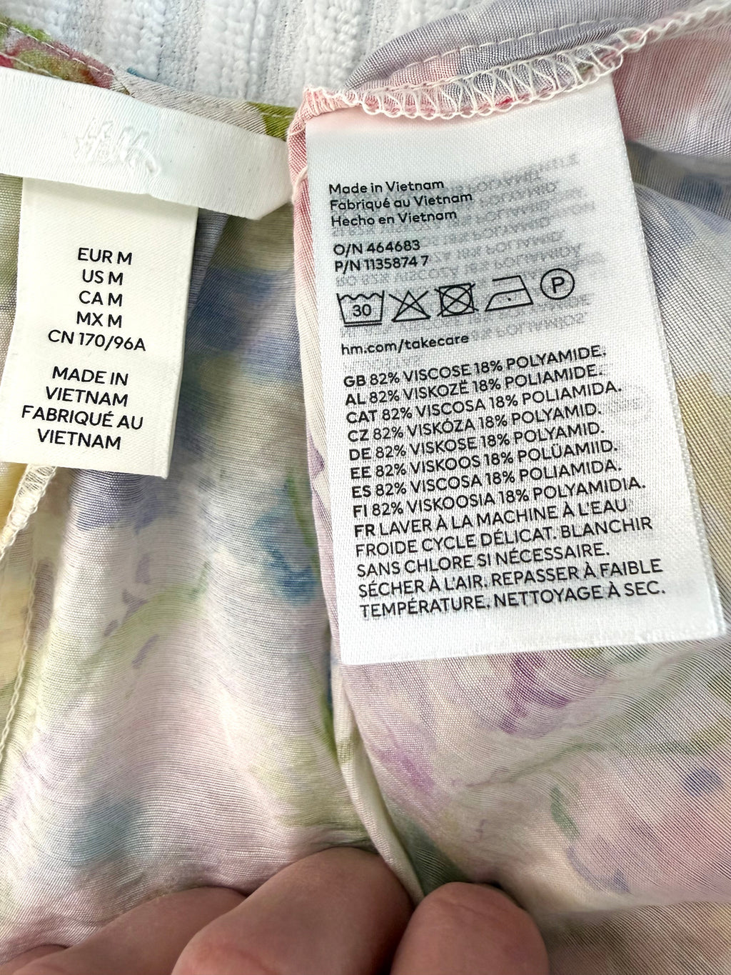 inside tags on Watercolour Boho Babydoll Mini Dress | Size M at Blue Sparrow Shop