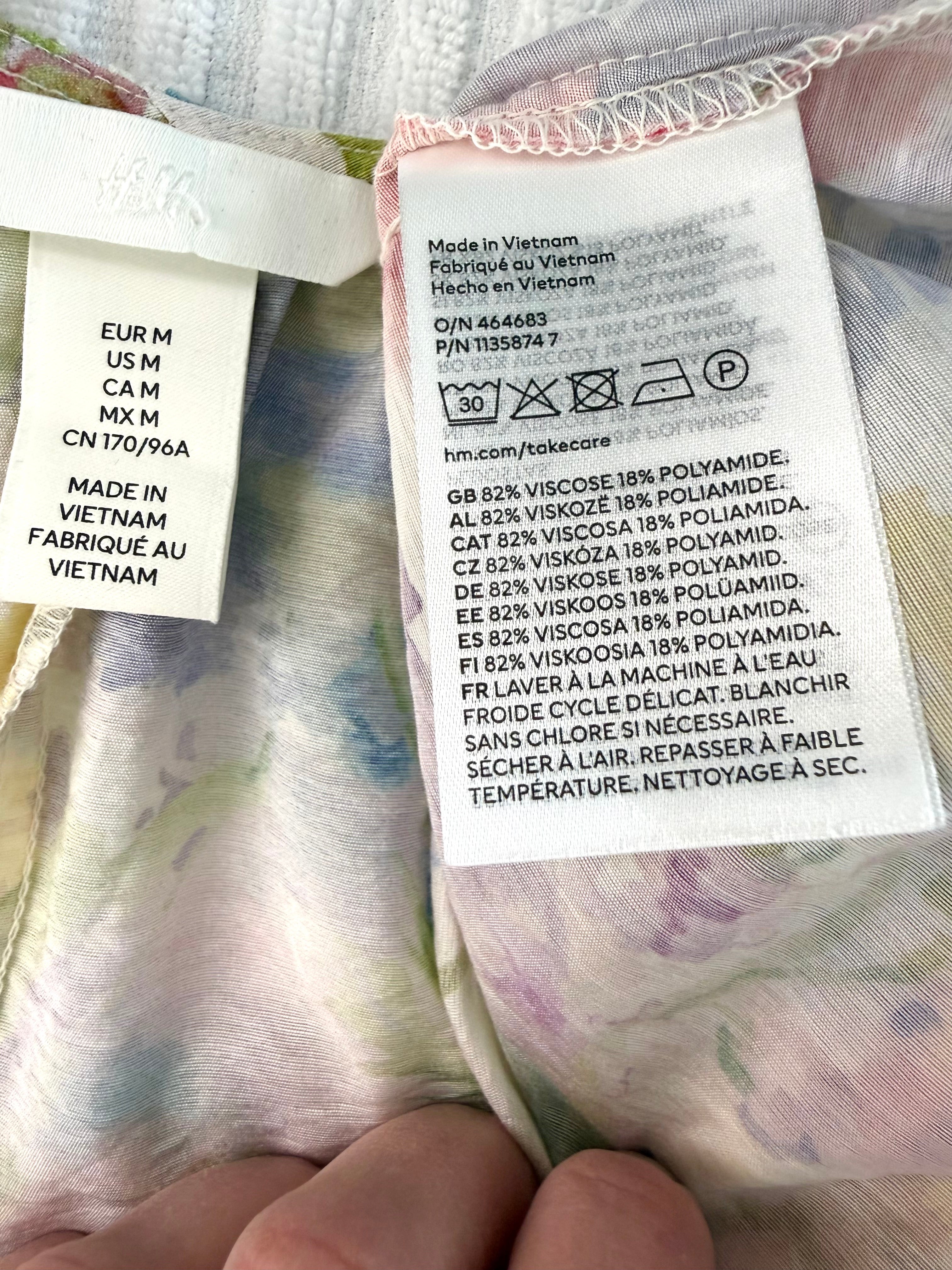inside tags on Watercolour Boho Babydoll Mini Dress | Size M at Blue Sparrow Shop