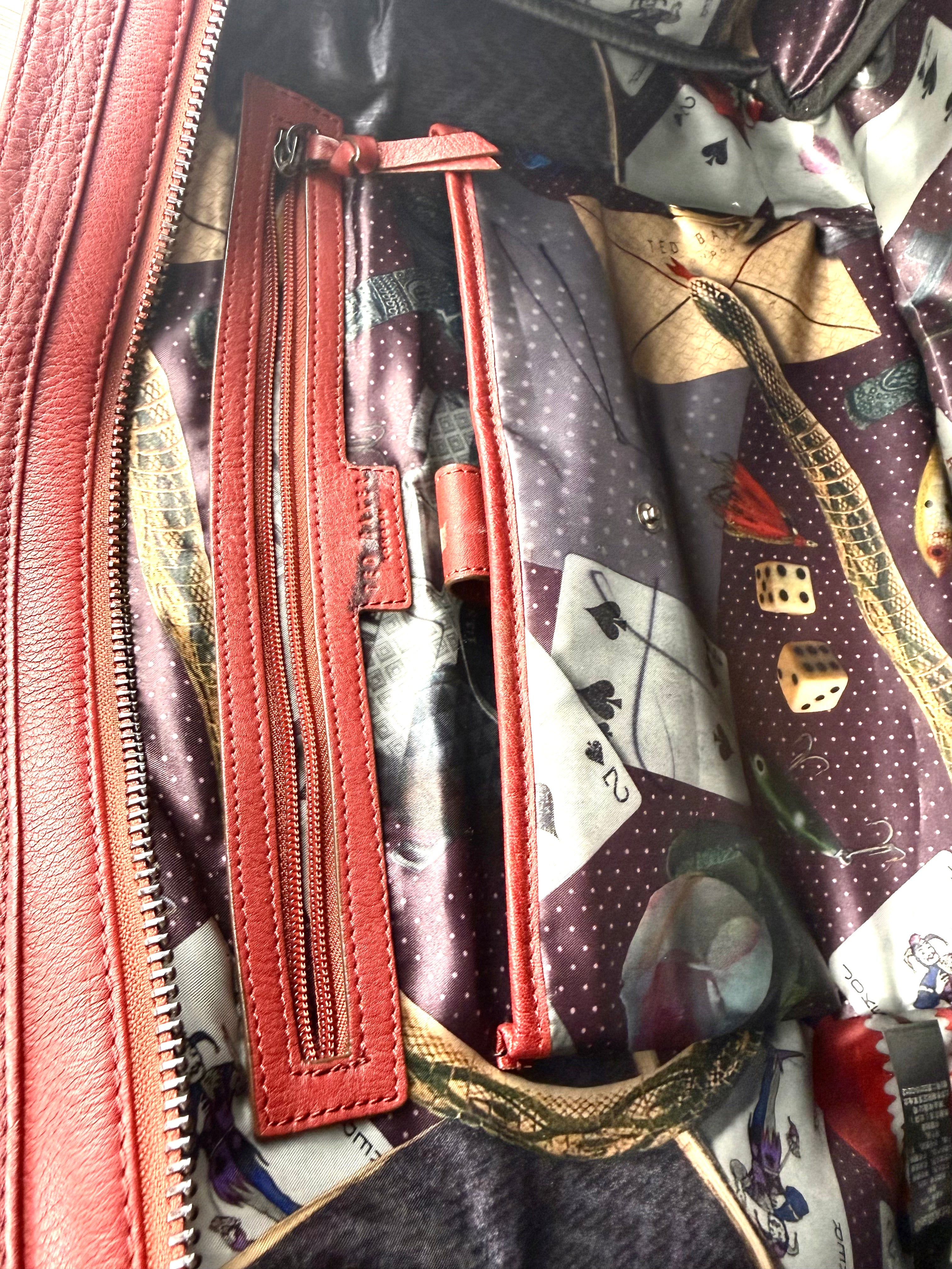 inside zip pocket and phone holder inside Ted Baker London Leather Duffle Travel Bag 