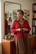 jones new york flutter sleeve cardigan on ai woman wearing autumn colours standing by mirror